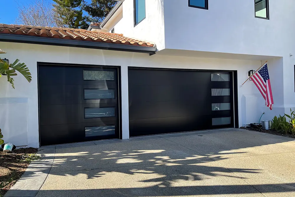 New modern garage doors installed at a homeowners house